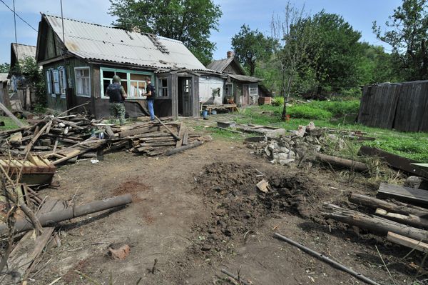 Conséquences de la chute d'un obus tiré depuis l'Ukraine sur la ville russe de Donetsk (région de Rostov). Conséquences de la chute d'un obus tiré depuis l'Ukraine sur la ville russe de Donetsk (région de Rostov). - Sputnik Afrique