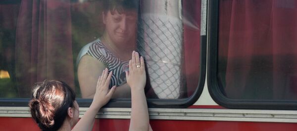 réfugiés de Donetsk réfugiés de Donetsk - Sputnik Afrique