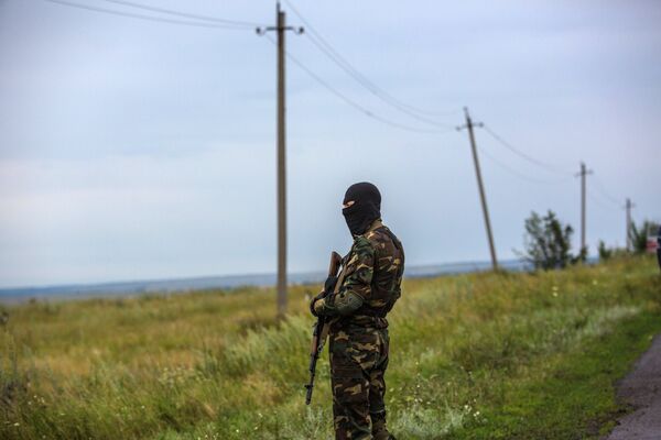 Ukraine: Porochenko ordonne un cessez-le-feu dans la zone du crash - Sputnik Afrique