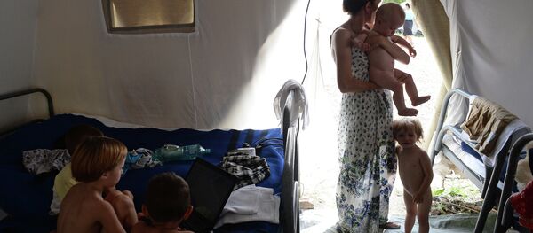 Dans un camp de réfugiés ukrainiens - Sputnik Afrique
