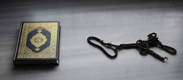 Coran et chapelet - Sputnik Afrique