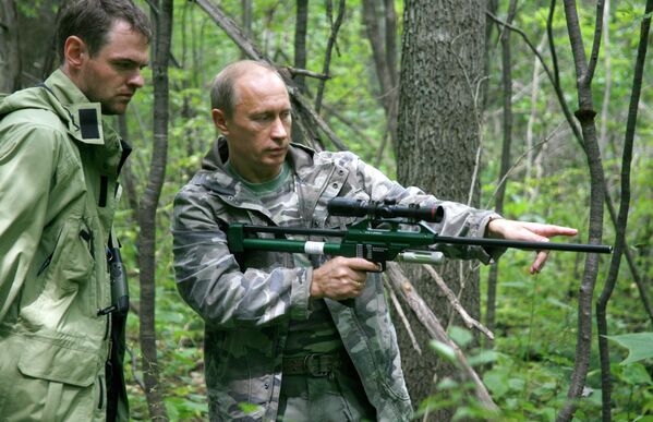 Vladimir Poutine au chevet des tigres de Sibérie - Sputnik Afrique
