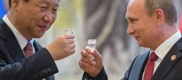 Vladimir Poutine et Xi Jinping - Sputnik Afrique