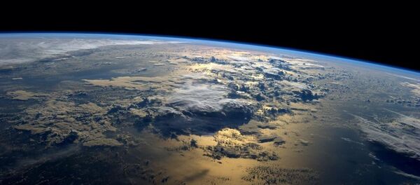 Фотография Земли, сделанная с борта МКС астронавтом NASA Рэдом Вейсманом - Sputnik Afrique