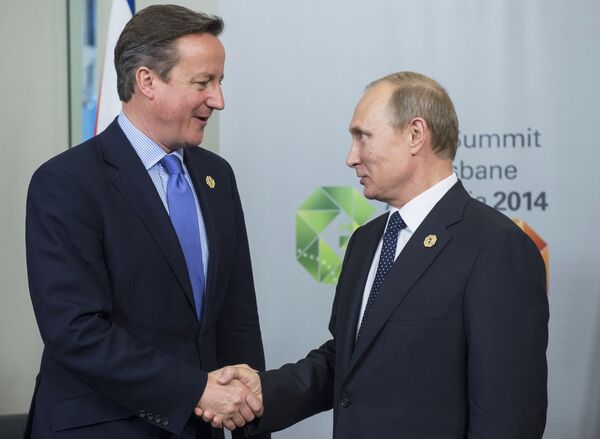 Président russe Vladimir Poutine et le premier ministre britannique David Cameron - Sputnik Afrique