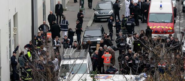 Police près de la rédaction de l'hebdomadaire français Charlie Hebdo (Archives) - Sputnik Afrique