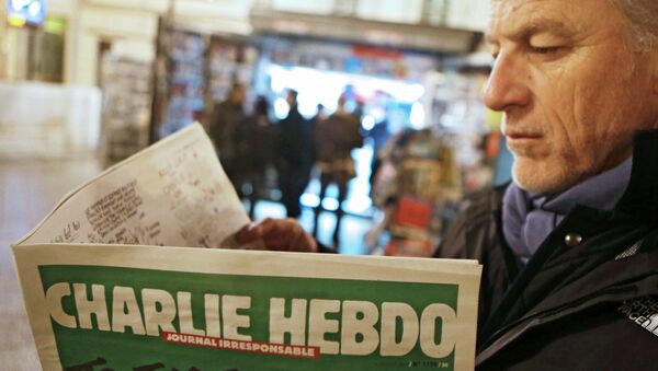 Le premier (après l'attentat ) numéro de l'hebdomadaire français satirique Charlie Hebdo - Sputnik Afrique