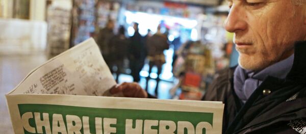 Le premier (après l'attentat ) numéro de l'hebdomadaire français satirique Charlie Hebdo - Sputnik Afrique