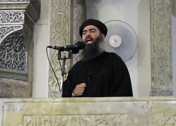 Leader du groupe terroriste Etat islamique (EI) Abou Bakr al-Baghdadi - Sputnik Afrique