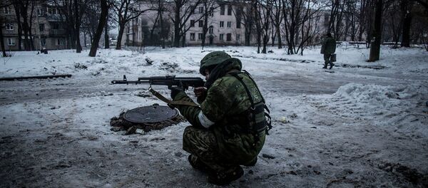 Ополченец в Киевском районе Донецка. 22 января 2015 - Sputnik Afrique